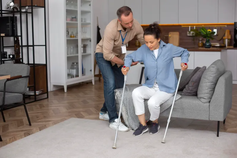 full-shot-woman-with-crutches-scaled-2